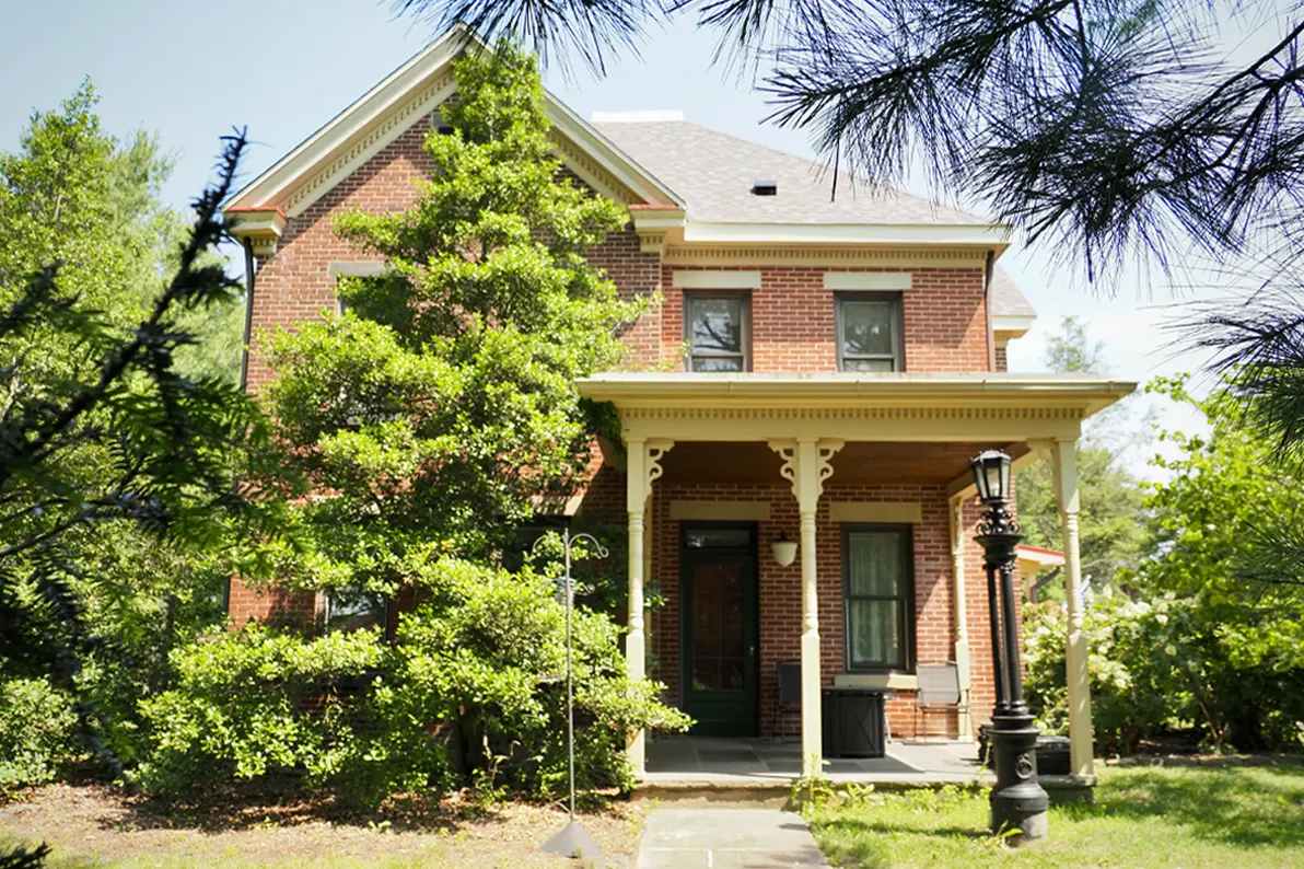 front view showcasing the brick facade for the wooland manor