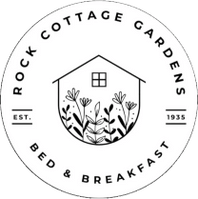 Rock Cottage Garrdens Logo white circle with black lettering