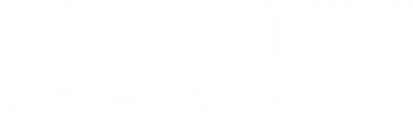 logo in white letters Inn at Soho Square