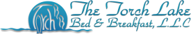 Logo for "The Torch Lake Bed & Breakfast, LLC" in blue, featuring stylized water waves and a circular design on the left with the word "Torch" inside, highlighting this charming bed and breakfast by Torch Lake.